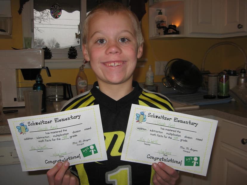 kids school awards 002 | JJ and his math awards from school.… | Flickr