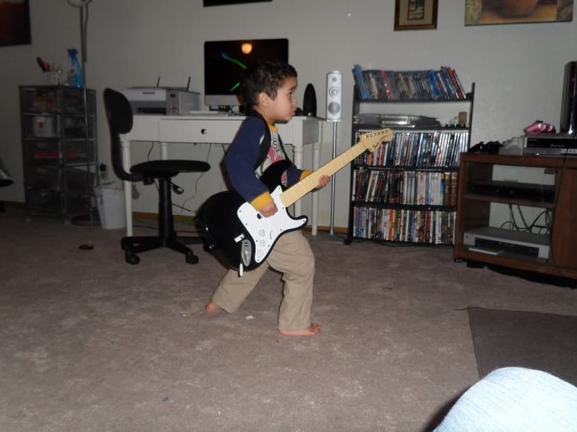 rocking out | rock band, kid, guitar, rock on | Adrienne May | Flickr