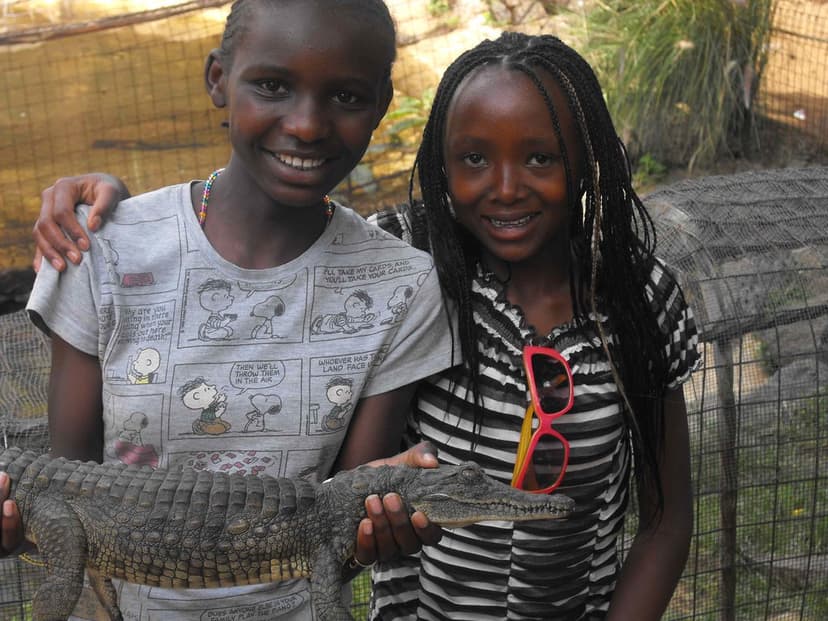 Salome and Ruth with baby crocodile | December 2011 ...