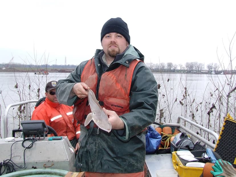 Ecological Services Biologist Matt Mangan holds a small pa… | Flickr
